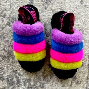 UGG fuzzy house slipper. Girls size 7